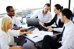 Business people working in office having meeting