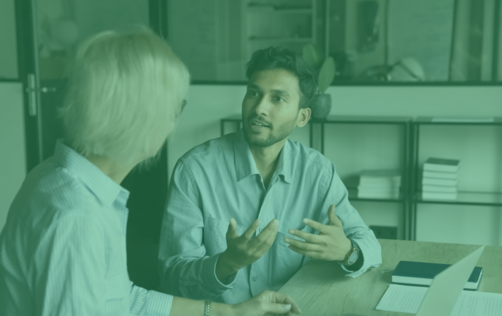 2 people giving and receiving feedback